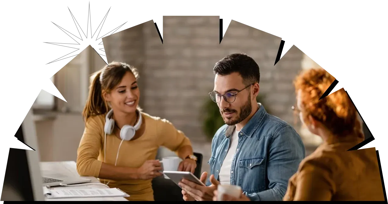 KYTHEL clients collaborating in their office while their systems run in the background